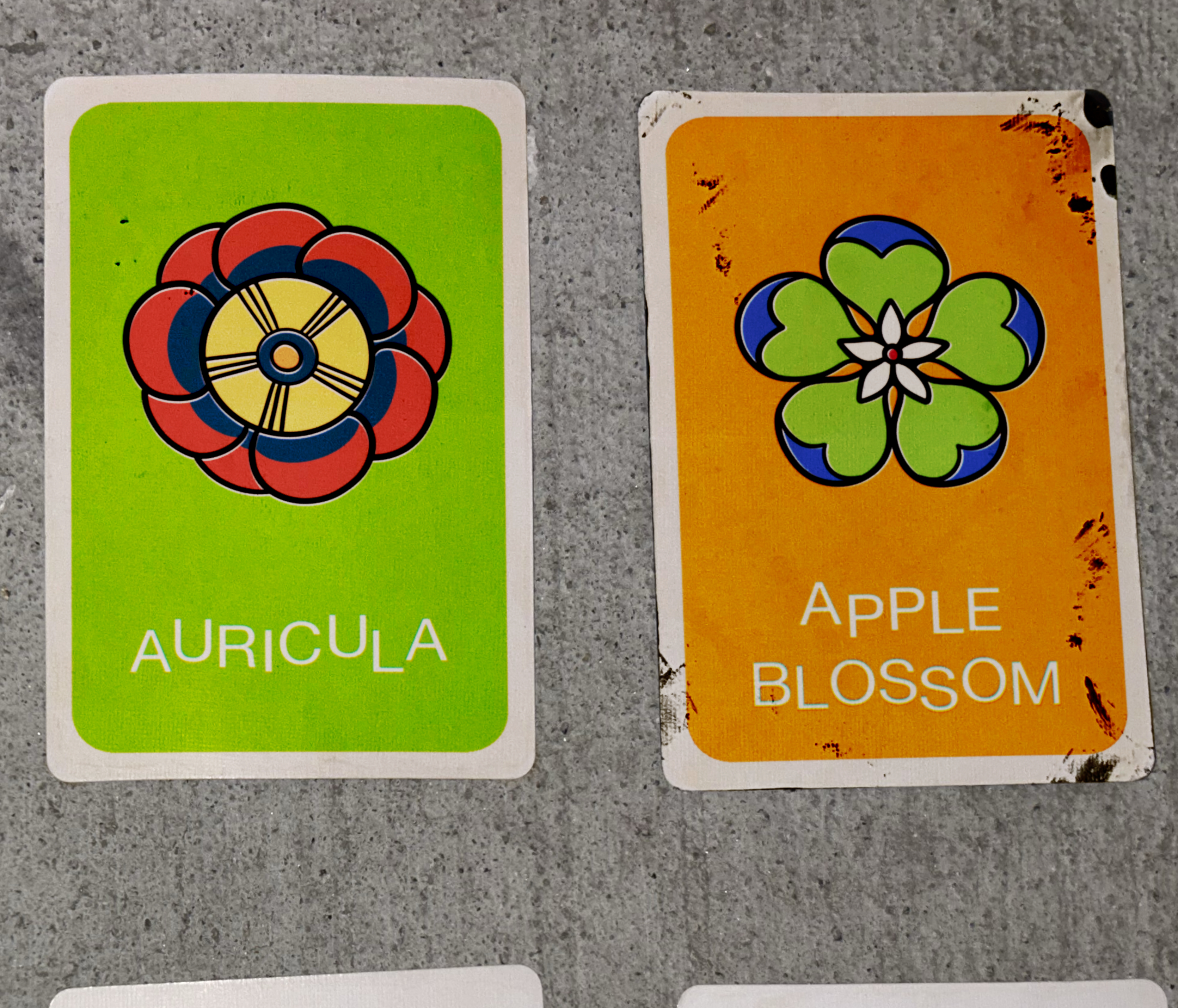 Two cards from the game Floriography.