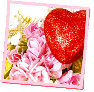 A gif of roses and a glittery heart decoration.