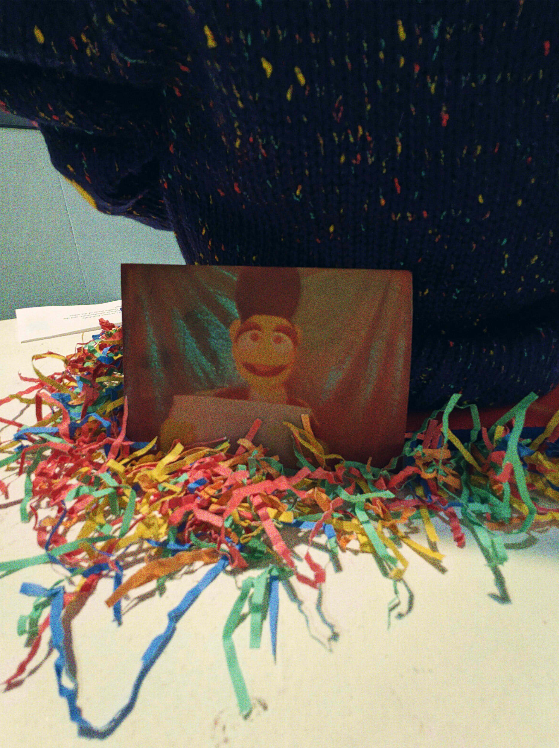 A photograph of a photograph of the original Wally Darling puppet smiling